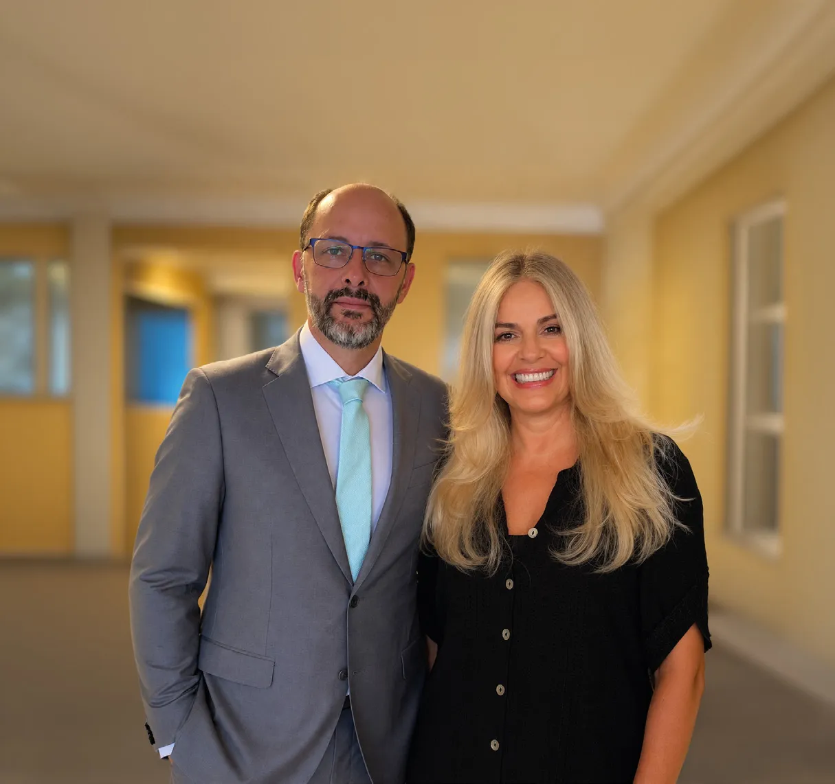 Joe Russell Jr e Denise Prado, equipe da Impart